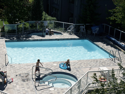 Enjoy the hot tub and swimming pool at the Gables